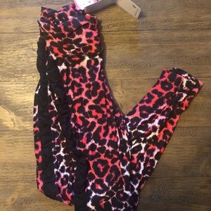 Pink cheetah leggings with black side stripe